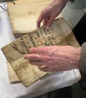 Handschriftfragment in handen
